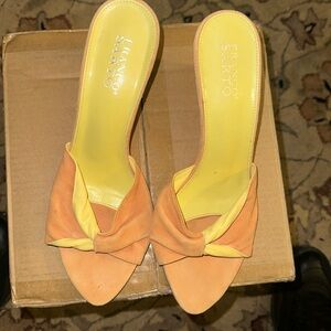 Pink and green wedge heels.